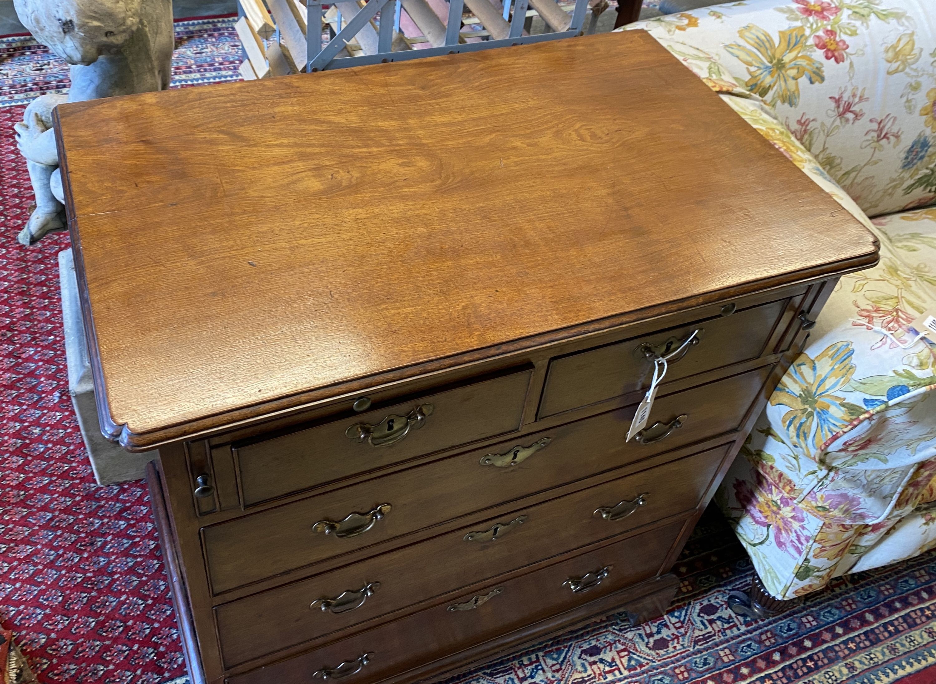 A George III mahogany bachelor's chest with brushing slide, width 82cm, depth 49cm, height 84cm
